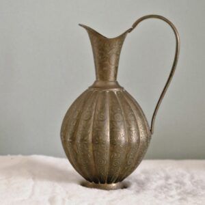 koperen pitcher